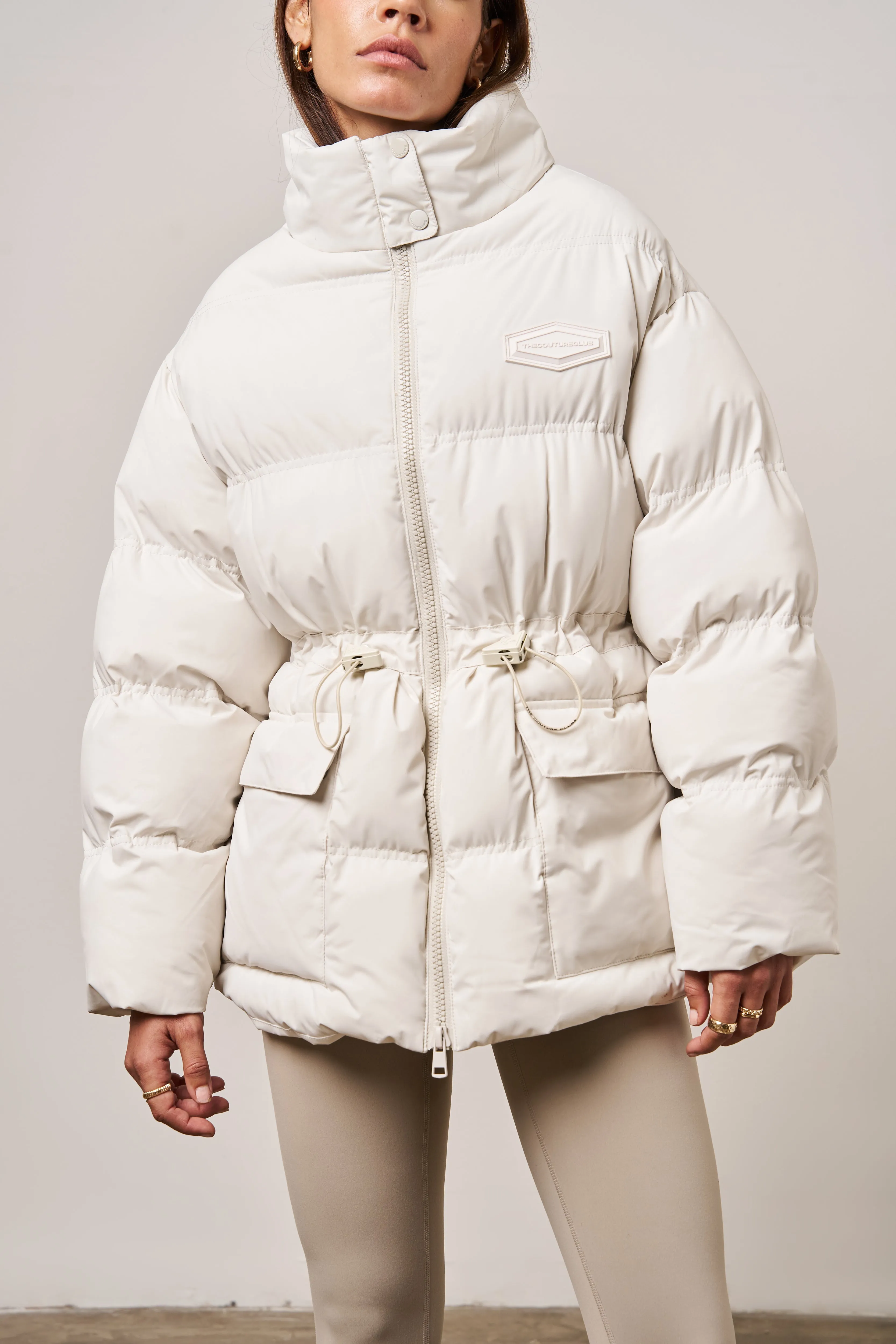 TIE WAIST PLEATED PUFFER COAT - OFF WHITE